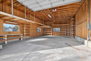 Garage featuring a garage door opener