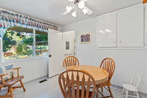 Dining room featuring ceiling fan