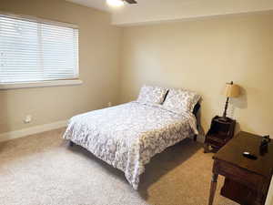 Bedroom featuring carpet floors and a ceiling fan
