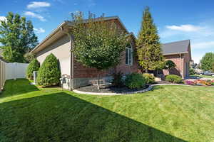 View of home's exterior with brick siding