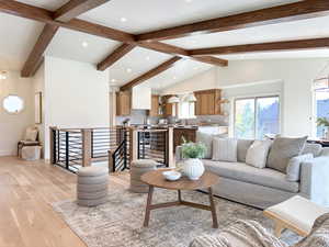 Living room featuring hardwood floors and natural light.