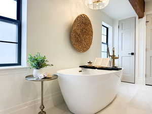 Bathroom featuring a freestanding tub