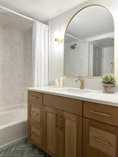 Full bathroom featuring mosaic tile