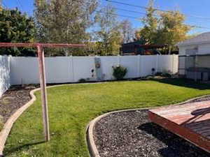View of fenced backyard