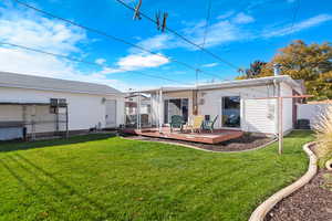 Back of property featuring a deck