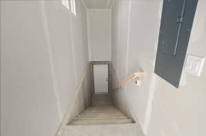 Stairway featuring electric panel