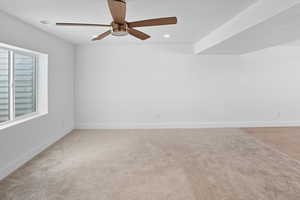 Unfurnished room with recessed lighting, a ceiling fan, and light colored carpet