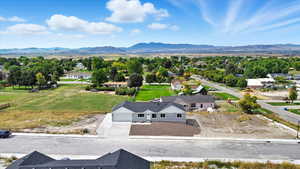 Aerial view of residential area with a mountainous background