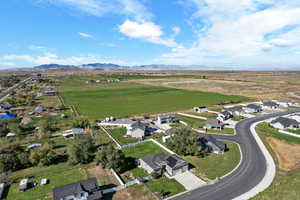 View of property location featuring rural landscape and nearby suburban area