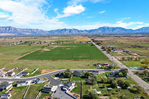 Overview of rural landscape with a mountain backdrop