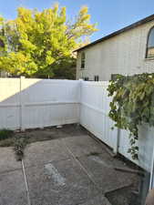 View of fenced backyard