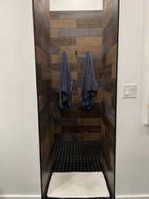 Full bathroom with a stall shower