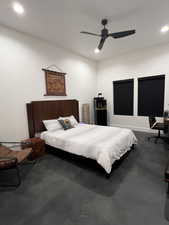 Bedroom with an office area, recessed lighting, and ceiling fan