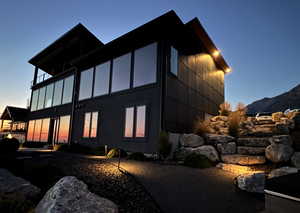 View of side of property featuring a balcony