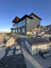 Exterior space featuring a jacuzzi