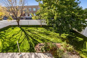 View of fenced backyard