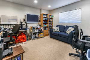 Carpeted office with recessed lighting