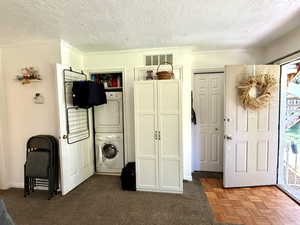 Entry with laundry closet.