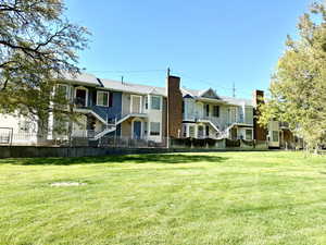 View of property with a large park out the front door.
