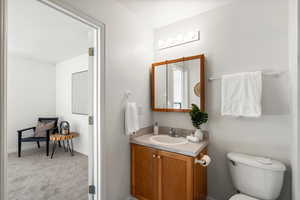 Connected bath with vanity