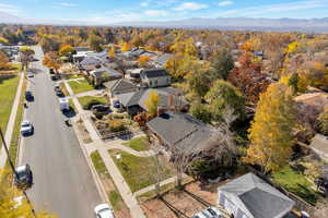 Aerial view of residential area with a mountainous background