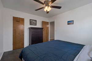 Upstairs Bedroom #3 with carpet, a ceiling fan, and a closet