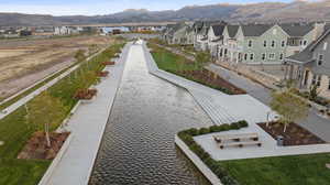 Aerial perspective of suburban area with a mountain backdrop