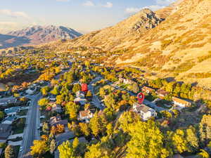 Aerial view of residential area featuring a mountain backdrop