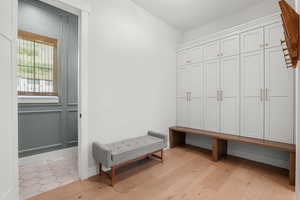 Mudroom featuring light wood-style flooring