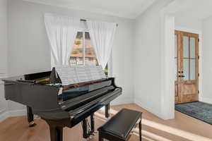 Sitting room featuring light wood finished floors
