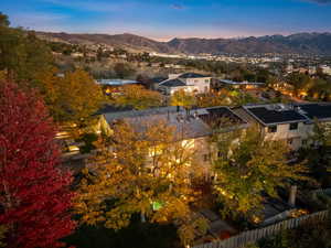 Aerial view of property's location with a mountain backdrop