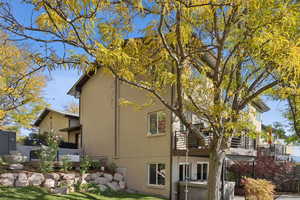 View of side of home with brick siding
