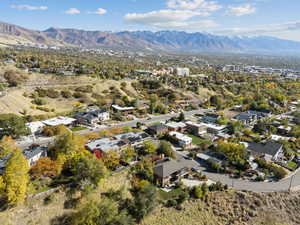 Aerial view of residential area with a mountain backdrop