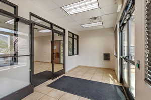 Building lobby featuring a drop ceiling