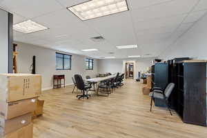 Office area featuring a paneled ceiling