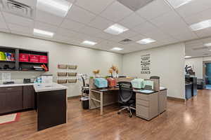 Home office with a paneled ceiling