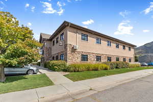 View of building exterior with a mountain view