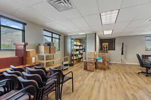 Office space featuring a paneled ceiling