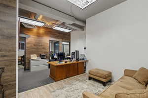 Home office with wooden walls