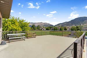 View of patio with a mountain view