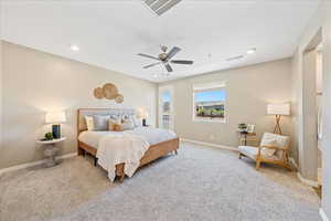 Bedroom featuring carpet, access to outside, a ceiling fan, and recessed lighting