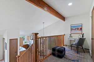 Sitting room with an upstairs landing, a baseboard radiator, recessed lighting, and carpet floors