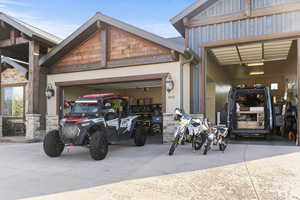 Garage featuring the toys that easily fit inside, ready for adventures.