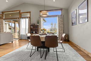 Dining space featuring light wood-style floors and recessed lighting