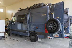 RV Garage front half showing sprinter van plugged-in
