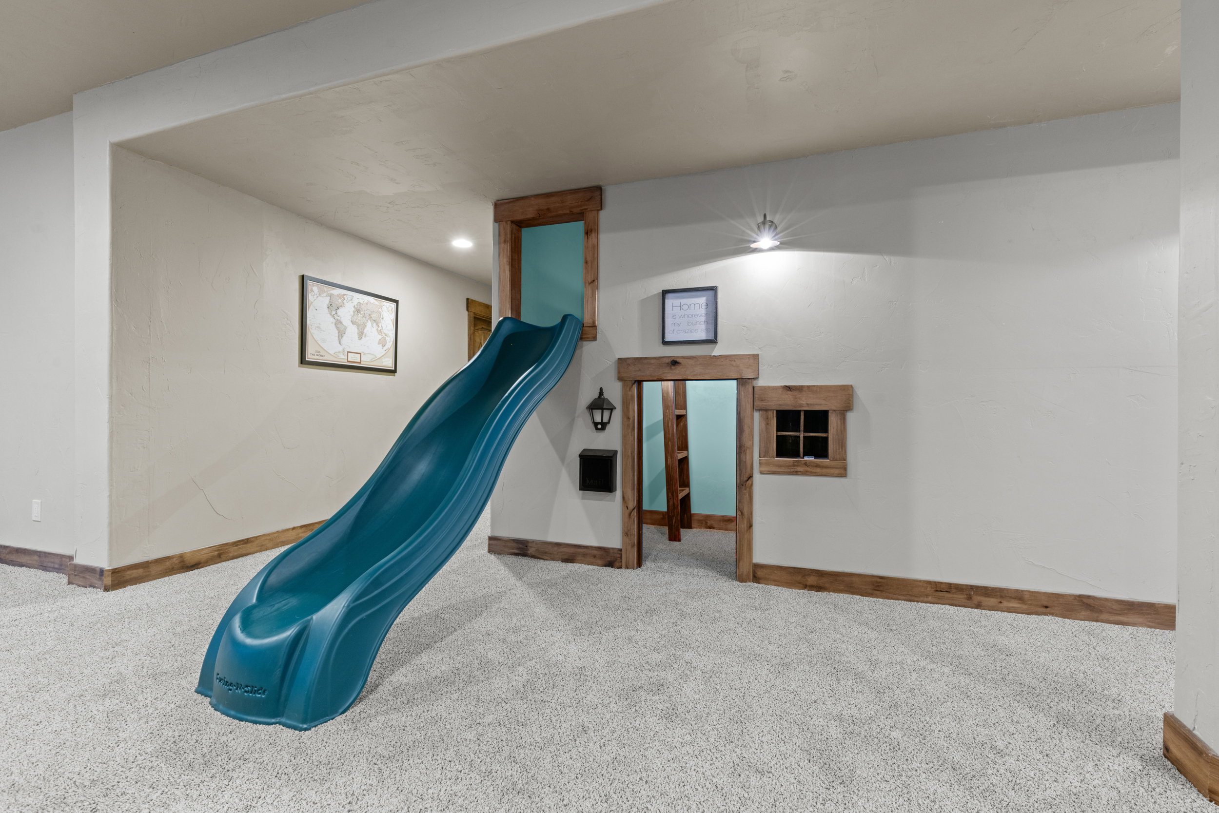 Built-in Playhouse featuring Slide, mailbox and window