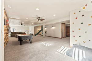 Rec room with light carpet, ceiling fan, and recessed lighting