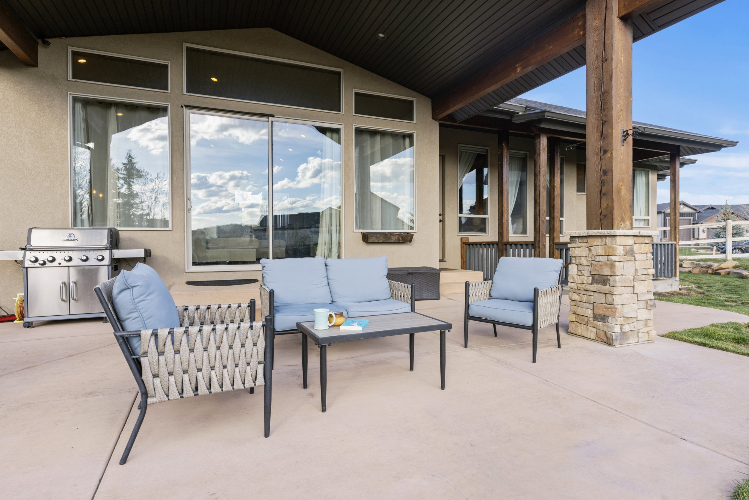 View of  back covered patio- accessible from Primary bedroom and Great room.