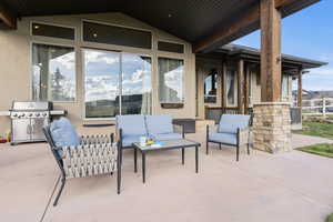 View of  back covered patio- accessible from Primary bedroom and Great room.