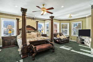 Primary Bedroom featuring dark colored carpet, crown molding, a textured ceiling, ceiling fan, and recessed lighting